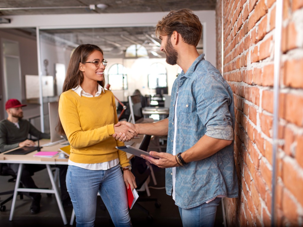 Manager Shaking Hand with Designer